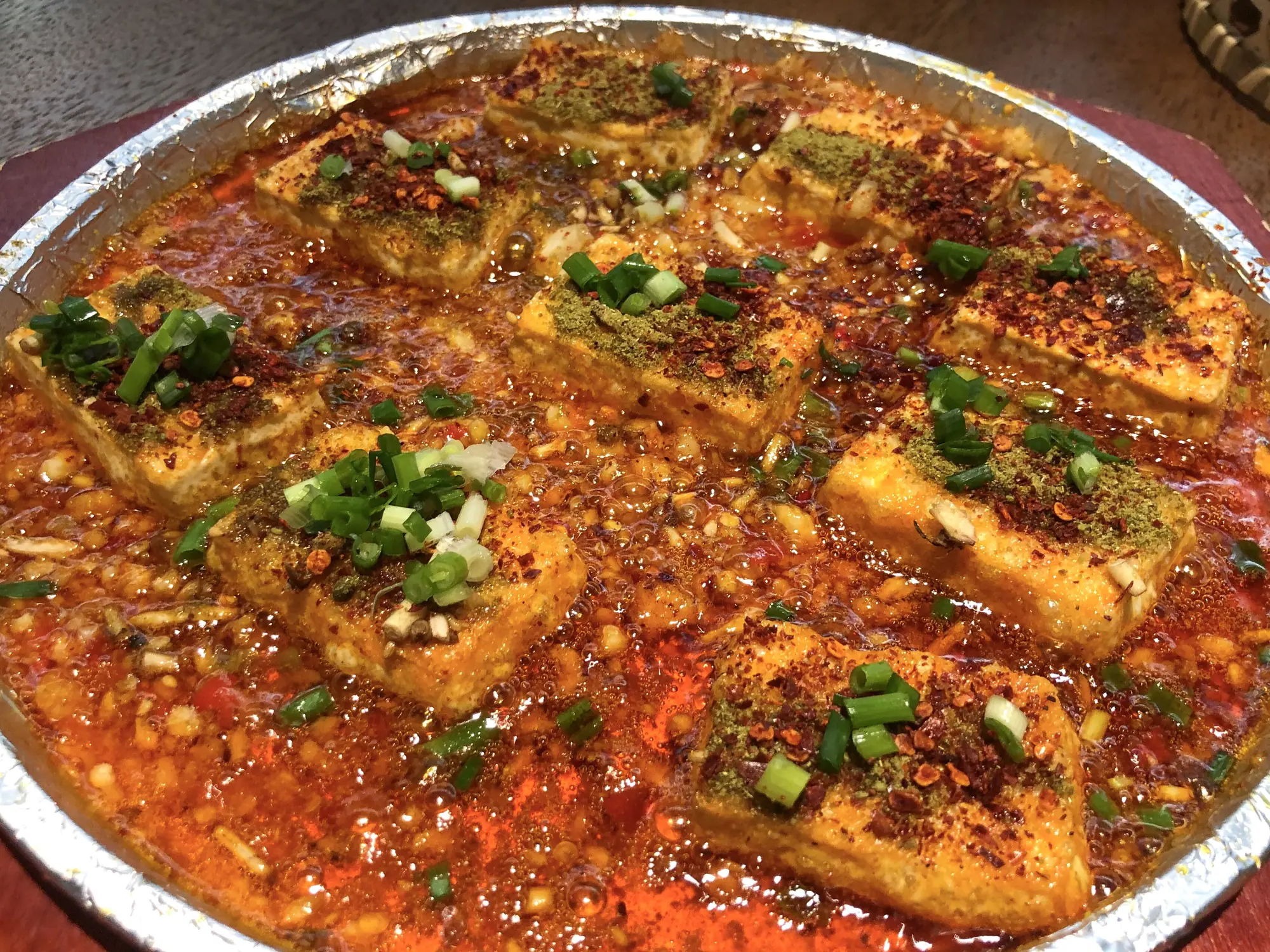 红油煮出的鱼与豆腐